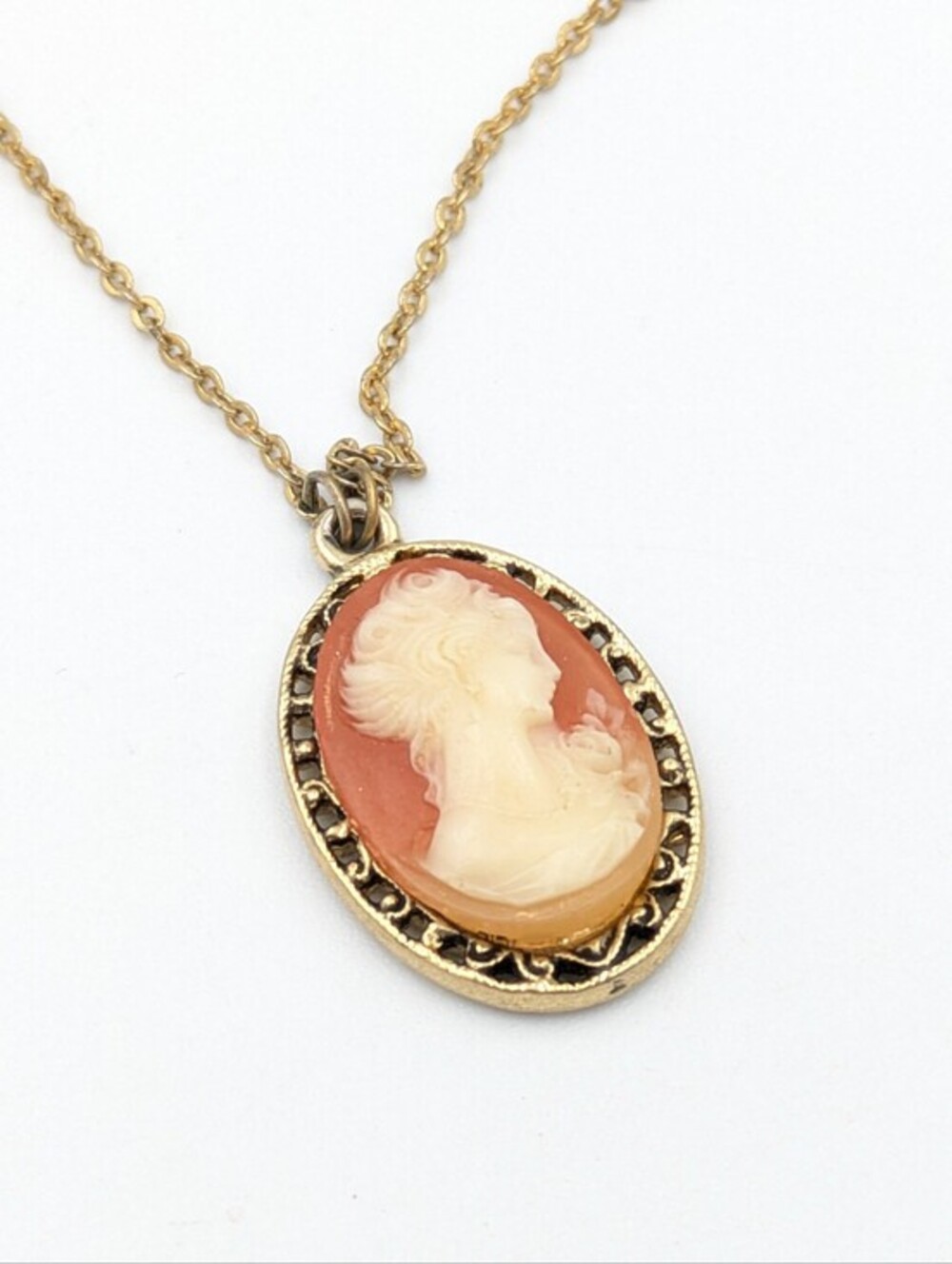 1928 brand gold tone faux cameo pendant necklace